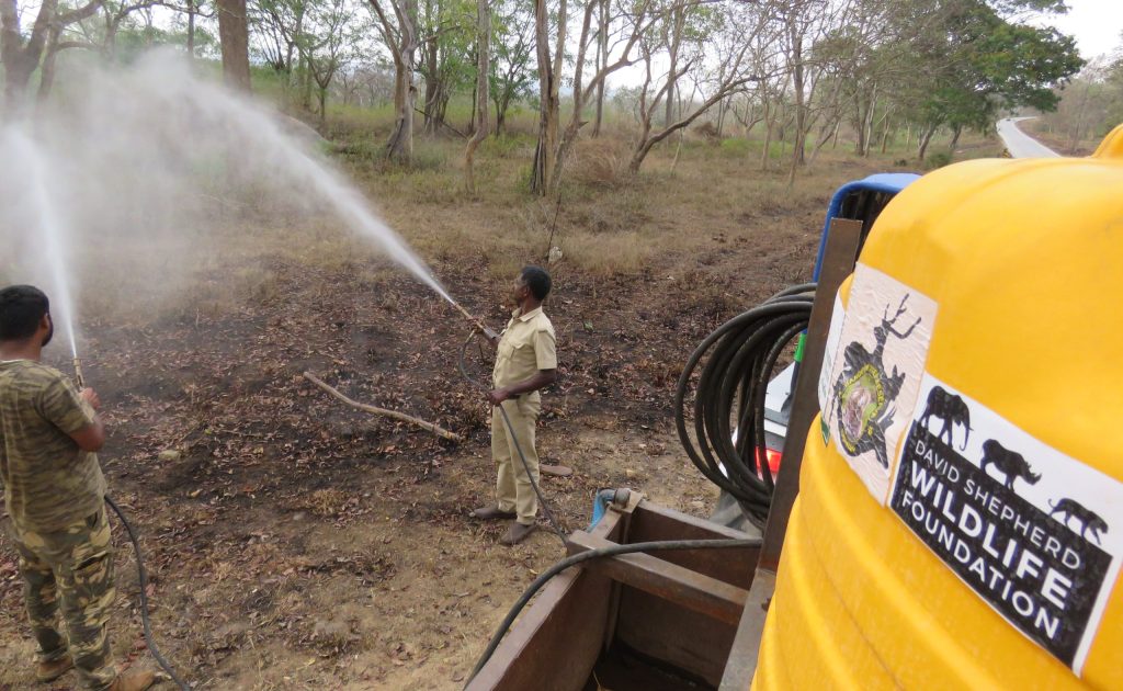 The modified tractor to control forest fires in action at Bandipur TR