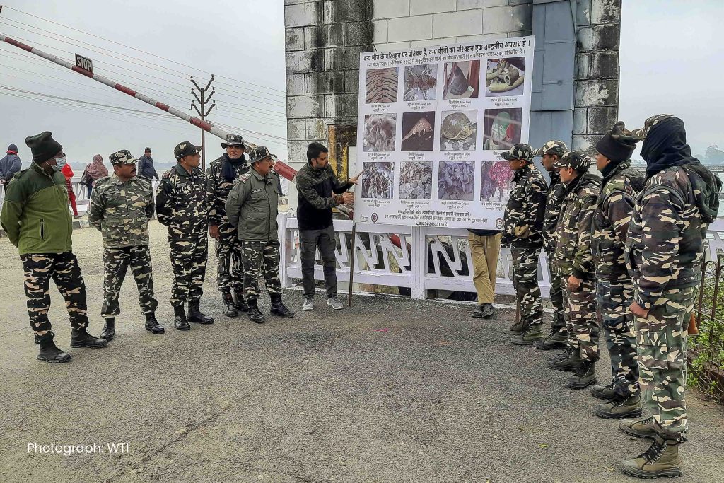 cross border wildlife crime prevention poster at Indo-Nepal border